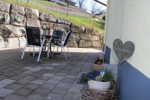 Patio nebo venkovní prostory v ubytování Ferienwohnung am Weinberg