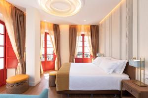 Säng eller sängar i ett rum på Hotel El Pilar Andalucia
