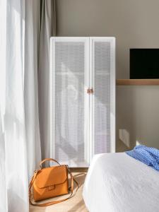 Postel nebo postele na pokoji v ubytování OKKO Hotels Nice Aéroport