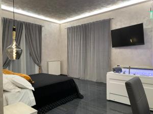 A television and/or entertainment centre at Green Oasis Gabella