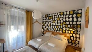 Cama o camas de una habitación en Hostel La Corredera