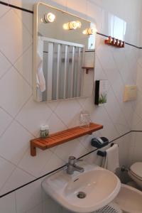 Koupelna v ubytování Hotel Villa Cecilia