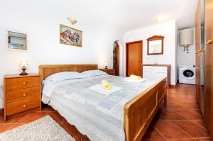 Postel nebo postele na pokoji v ubytování House Ulika