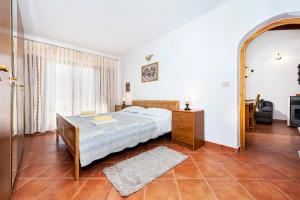 Postel nebo postele na pokoji v ubytování House Ulika