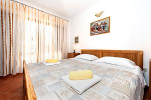 Postel nebo postele na pokoji v ubytování House Ulika