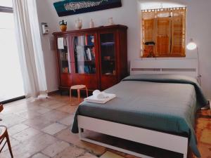 Postel nebo postele na pokoji v ubytování B&B Casa di Giò