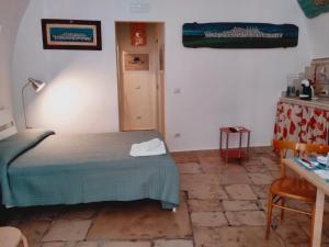 Postel nebo postele na pokoji v ubytování B&B Casa di Giò