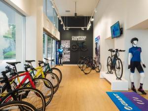 a group of bikes parked in a bike showroom at SHIRAHAMA KEY TERRACE SEAMORE RESIDENCE - Vacation STAY 35167v in Kanayama