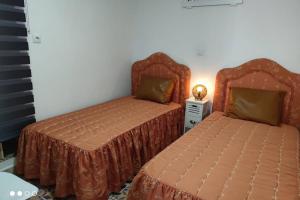 Ένα ή περισσότερα κρεβάτια σε δωμάτιο στο Apartamento Los Tulipanes