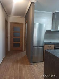 Kuchyň nebo kuchyňský kout v ubytování Apartamento reformado 2º