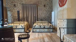 Posteľ alebo postele v izbe v ubytovaní Rocca degli Olivi