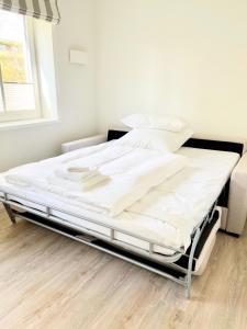 Ένα ή περισσότερα κρεβάτια σε δωμάτιο στο Villa Wattfuss