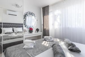 Posteľ alebo postele v izbe v ubytovaní Porta Aurea di Spalato, Luxury apartment