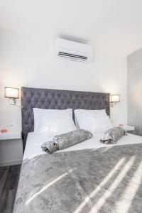 Posteľ alebo postele v izbe v ubytovaní Porta Aurea di Spalato, Luxury apartment