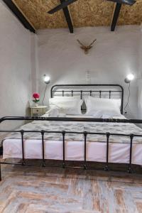 Cama o camas de una habitación en Olive View Loft