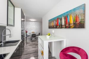 Kuchyňa alebo kuchynka v ubytovaní Porta Aurea di Spalato, Luxury apartment + 37 fotografií