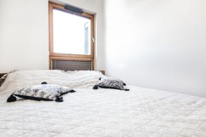 Кровать или кровати в номере GDAŃSK blisko MORZA nowy Apartament