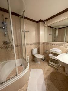 Kúpeľňa v ubytovaní Apartament 3 pokojowy Międzyzdoje 55m2 - 200 metrów od morza
