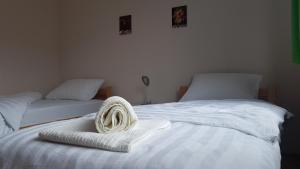 Postel nebo postele na pokoji v ubytování Apartman Jovanović