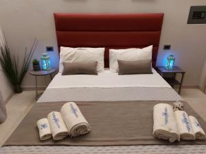 Posteľ alebo postele v izbe v ubytovaní Casa Vacanze Piccolpasso 20