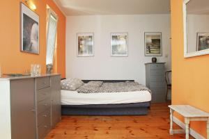 En eller flere senge i et værelse på Apartament Słoneczne Gniazdko z miejscem parkingowym GRATIS cena niższa przy pobycie od 6 dni