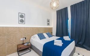 Ένα ή περισσότερα κρεβάτια σε δωμάτιο στο Andreotis Villas