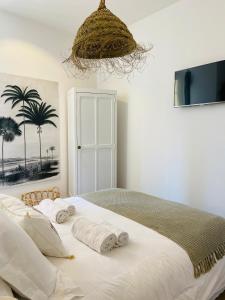 Postel nebo postele na pokoji v ubytování Appartement Casadilonda - Casadibastia - Vue mer Citadelle