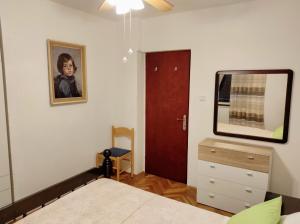 A bed or beds in a room at Apartment Andela - affordable