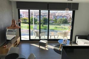 Posezení v ubytování Sun Terrace Apartment