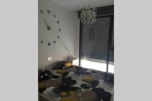 Postel nebo postele na pokoji v ubytování Sun Terrace Apartment