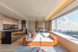 Posezení v ubytování Pan Pacific Serviced Suites Orchard, Singapore