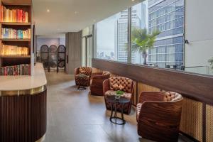 Posezení v ubytování Pan Pacific Serviced Suites Orchard, Singapore