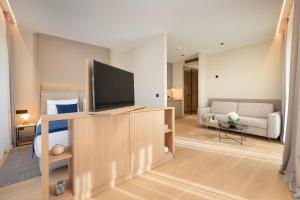 Телевизор и/или развлекательный центр в Boutique Hotel Porto