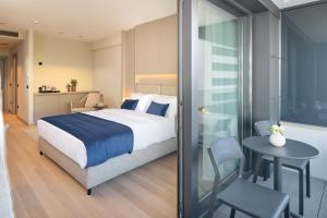 Кровать или кровати в номере Boutique Hotel Porto