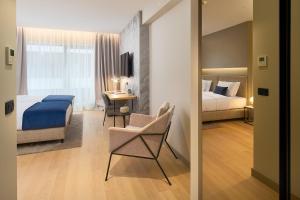 Кровать или кровати в номере Boutique Hotel Porto