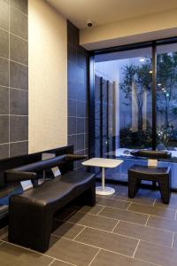 Posezení v ubytování HOTEL SUITE HIROSHIMA YOKOGAWA