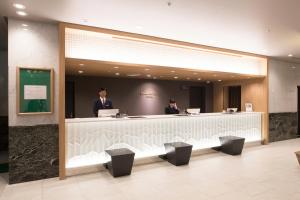 Lobby o reception area sa Toyama Chitetsu Hotel