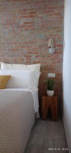 Posteľ alebo postele v izbe v ubytovaní OlioeAlloro B&B