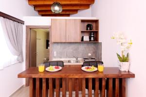 Kuchyňa alebo kuchynka v ubytovaní Paraskevi Luxury Apartments