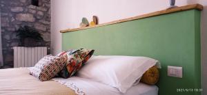 Posteľ alebo postele v izbe v ubytovaní OlioeAlloro B&B