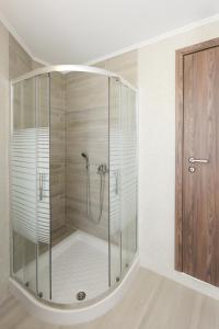 Kúpeľňa v ubytovaní Paraskevi Luxury Apartments