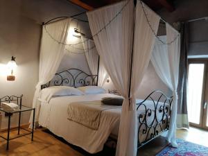 Llit o llits en una habitació de Relais Castrum Boccea