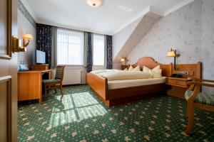 Postel nebo postele na pokoji v ubytování Landgasthof Redeker + 23 fotografií