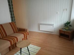 Posedenie v ubytovaní Vámház Apartman