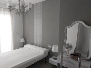 Postel nebo postele na pokoji v ubytování Hotel Sur Utopia
