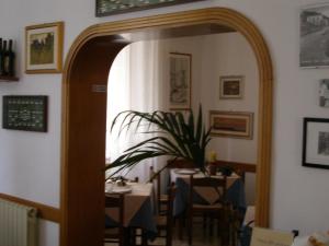 Um restaurante ou outro lugar para comer em Hotel Fiammetta