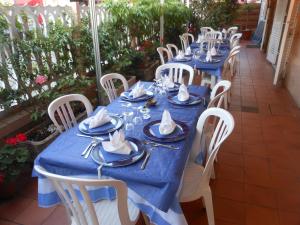 Um restaurante ou outro lugar para comer em Hotel Fiammetta