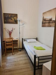Posteľ alebo postele v izbe v ubytovaní Amber Hostel