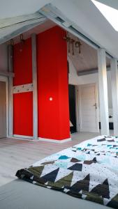 Fotografia z galérie ubytovania Apartament Witkacego Czerwony v destinácii Słupsk