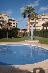 Bazén v ubytovaní Las Marinas Grand Terrace alebo v jeho blízkosti